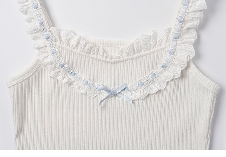 リボン結びのブルーコントラストホワイトフリルレーストリムのスイートノースリーブトップス