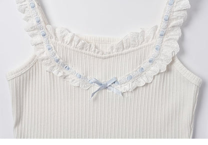 リボン結びのブルーコントラストホワイトフリルレーストリムのスイートノースリーブトップス