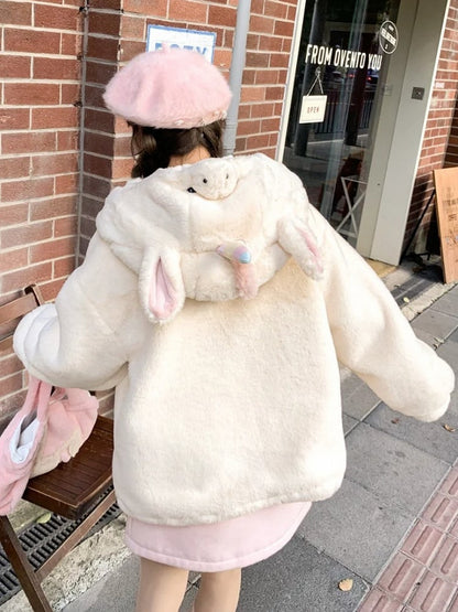 Beigefarbener Fleece-Kapuzenpullover mit Buchstabenmuster und Einhornkopf