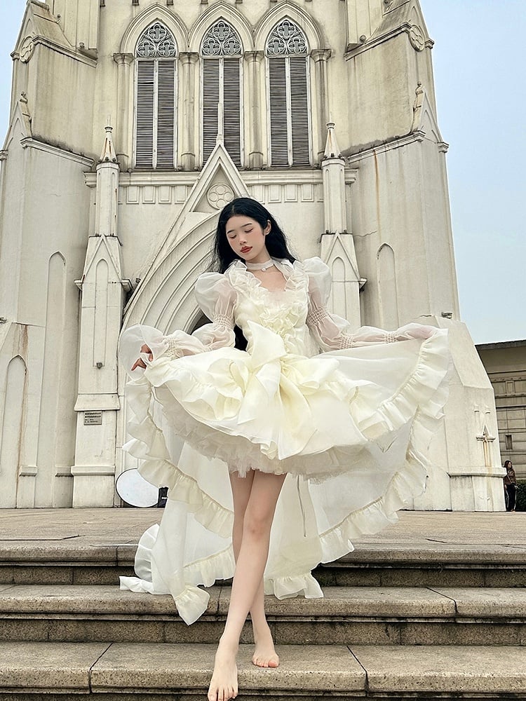 Hellgelbes, transparentes Oberteil mit langen Ärmeln und kaskadierendem Rüschensaum