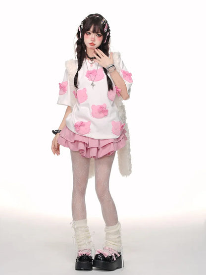 白/ピンクの蝶結びTシャツ柄 かわいい子猫