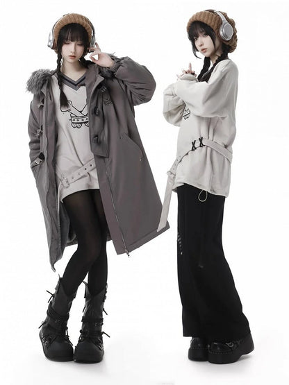 袖に星のアップリケが付いたフェイクファーカラーのグレーコート