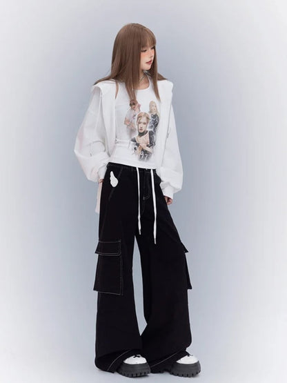 Weite Cargo-Jeans mit Flügeln und Riemendesign zum Selbstbinden und schwarzem Engel