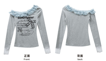 Graues Oberteil mit Buchstaben und asymmetrischem Ausschnitt und Spitzenmanschetten