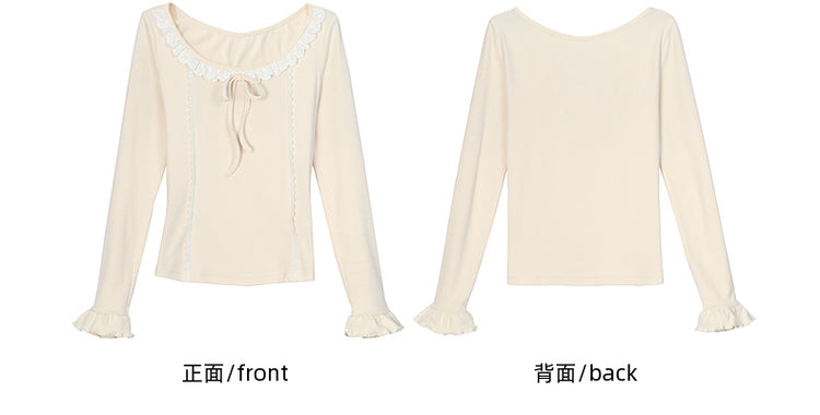 Aprikosenfarbenes, langärmliges Oberteil mit Spitzenbesatz und Schleifendetails