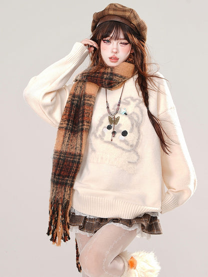 ミルクイエロー/ブラック/レッドのキュートな子犬柄のゆったりセーター