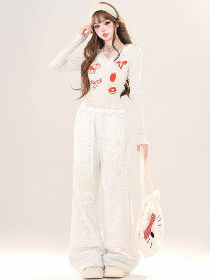 Schwarz/Graues Cartoon-Top mit V-Ausschnitt und Spitzenbesatz