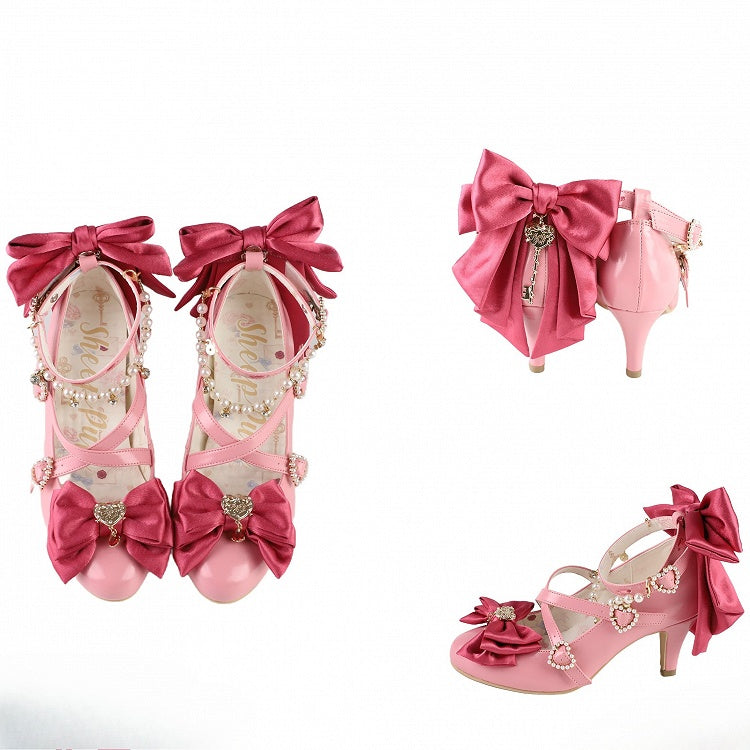 クリスクロストップにハートとローズのビーズリボンをあしらったピンクのチャーム