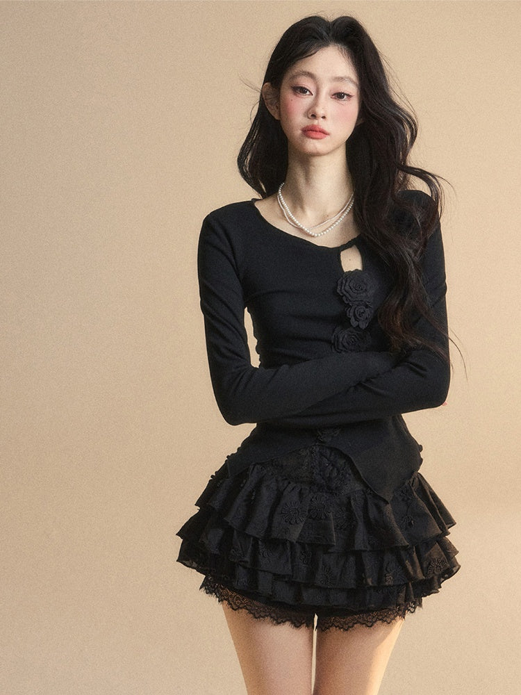 Schwarzes Top mit rundem, glamourösem Detail und gestricktem Halsausschnitt, Blumenverzierung und Cut-Outs