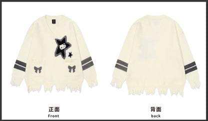 アプリコットキティとスターのディストレストリムVネックセーター