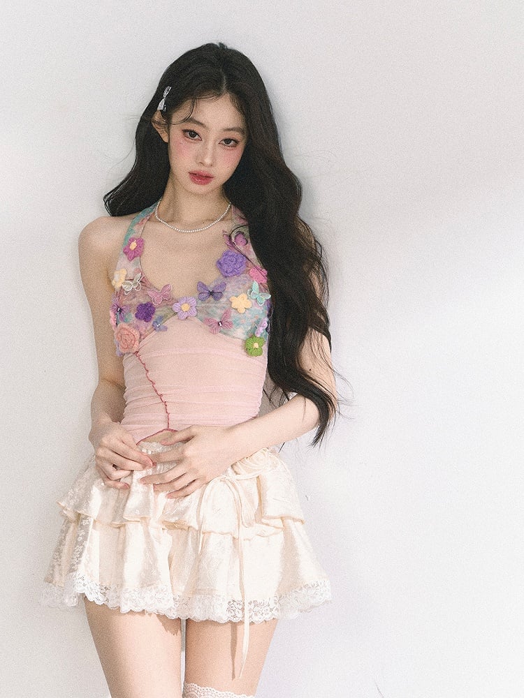 花柄装飾のピンクのレタス裾トップス ニット ホルターネック