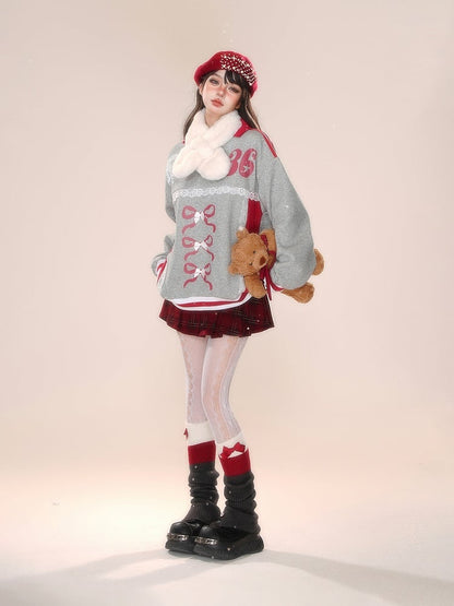 Blokette Core Sweatshirt mit V-Ausschnitt, Schleife und Zahlendruck