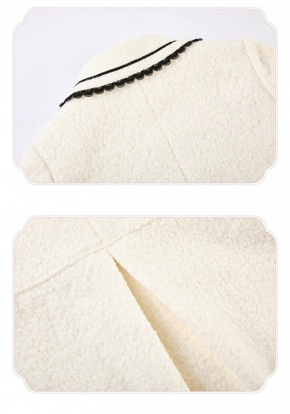 Schwarze herzförmige Wolltaschen mit weißer Stickerei und Mantel