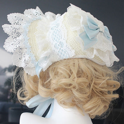 ピンク/ブルーの花柄リボンディテール、レーストリムのボンネット