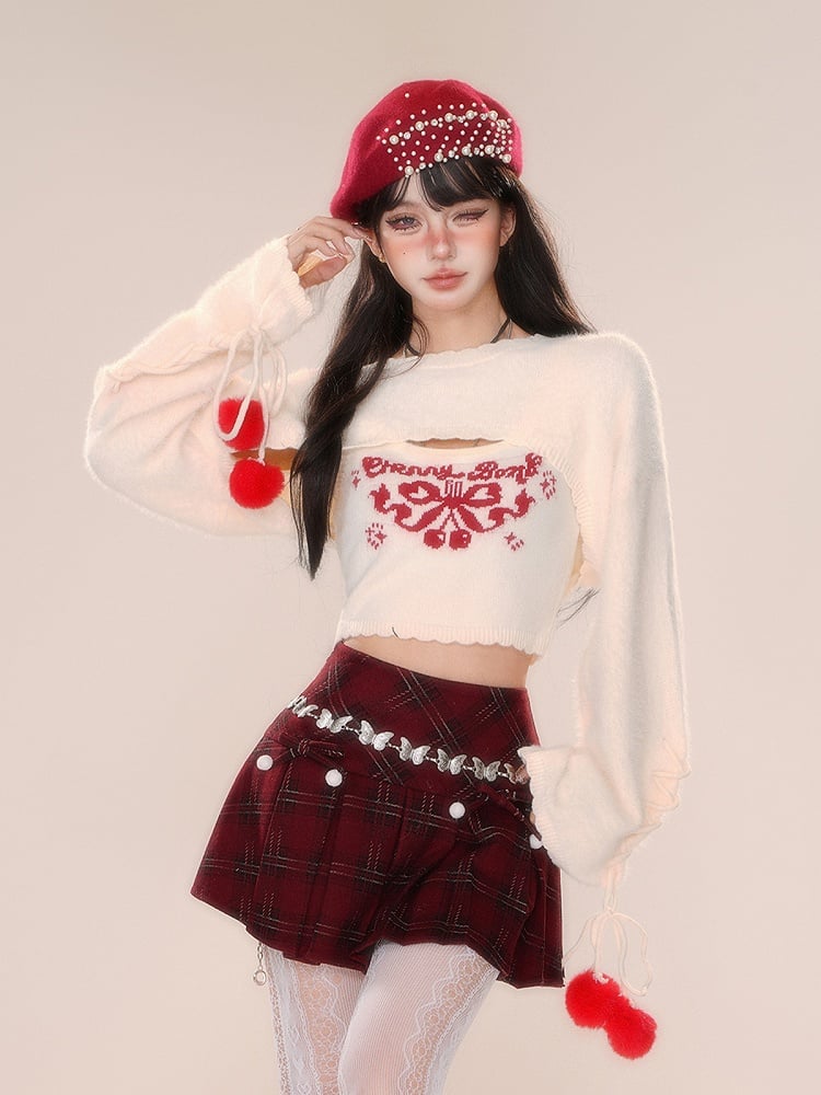 ピンクアプリコットの蝶結びクロップドトップス（シュラッグ付き）