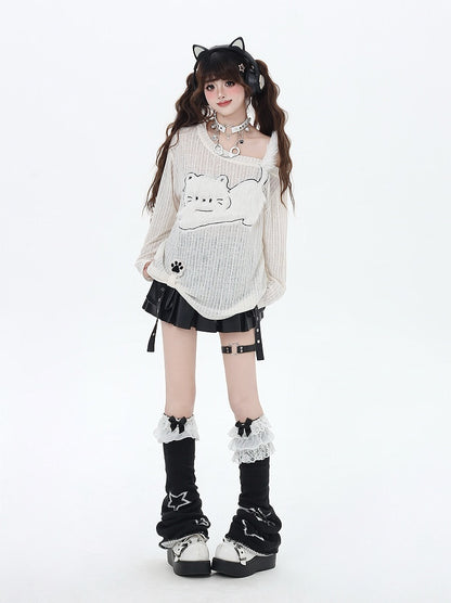 Beiges, halbtransparentes Top mit asymmetrischem Ausschnitt und Katzen-Applikation