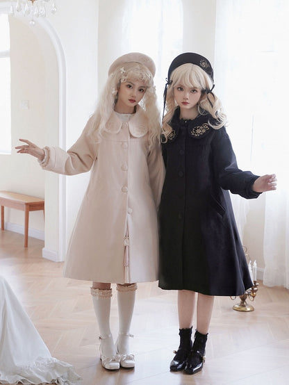 ブラックの繊細な花柄ラウンドフラットカラーウールコート