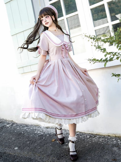 桜ピンクのセーラー風サマードレス プリーツディテールカフス
