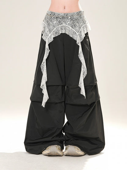 Grau/schwarze Hose mit weitem Bein und niedriger Leibhöhe und Spitzen-Accessoire an der Taille