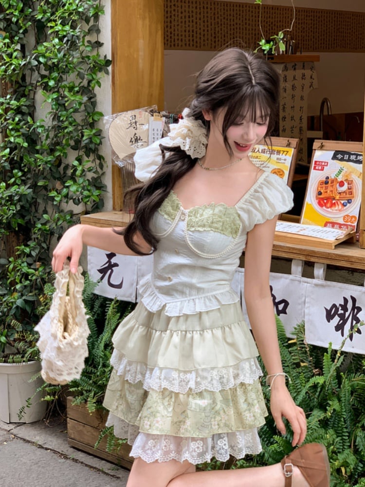 アプリコットのスウィートハートネックラインのパフスリーブのスイートトップス