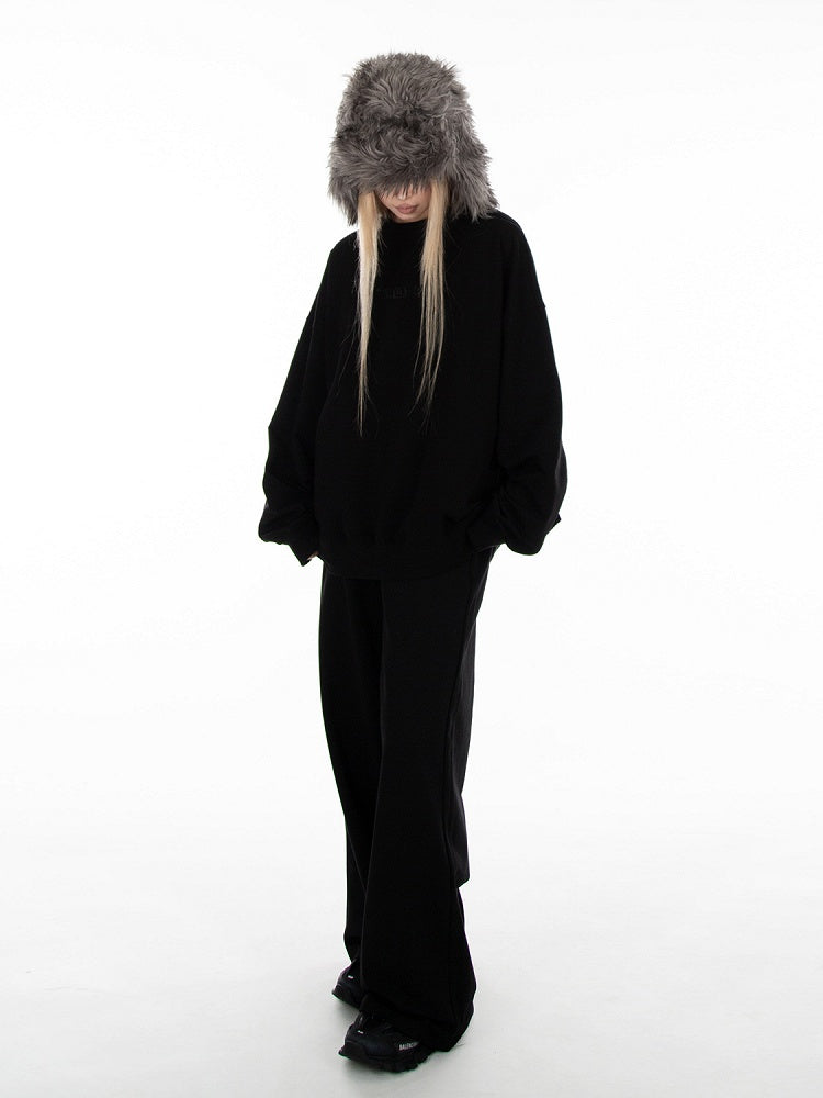 Schwarze, lockere Jogginghose mit weitem Bein und Schlupfdesign