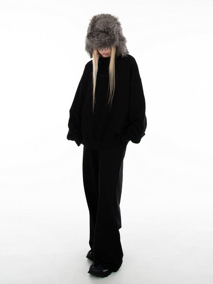 Schwarze, lockere Jogginghose mit weitem Bein und Schlupfdesign