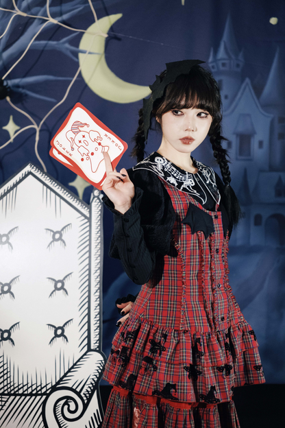 ドラキュラチェックノースリーブトップス