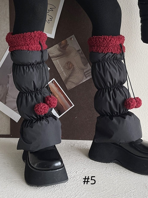 Süße Beinwärmer mit Schleife und Pompons