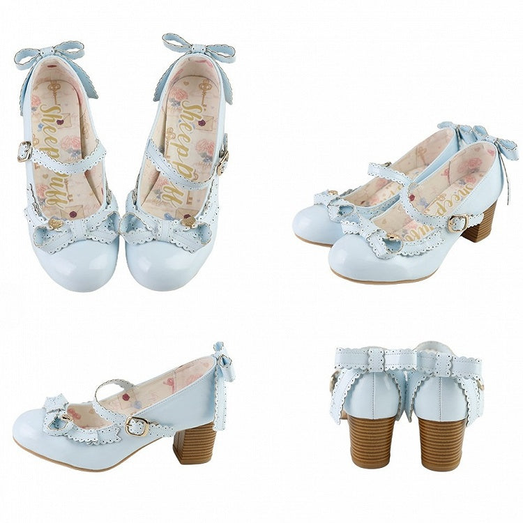 Janes Schleife verziert Mary Blue Top Herz bei
