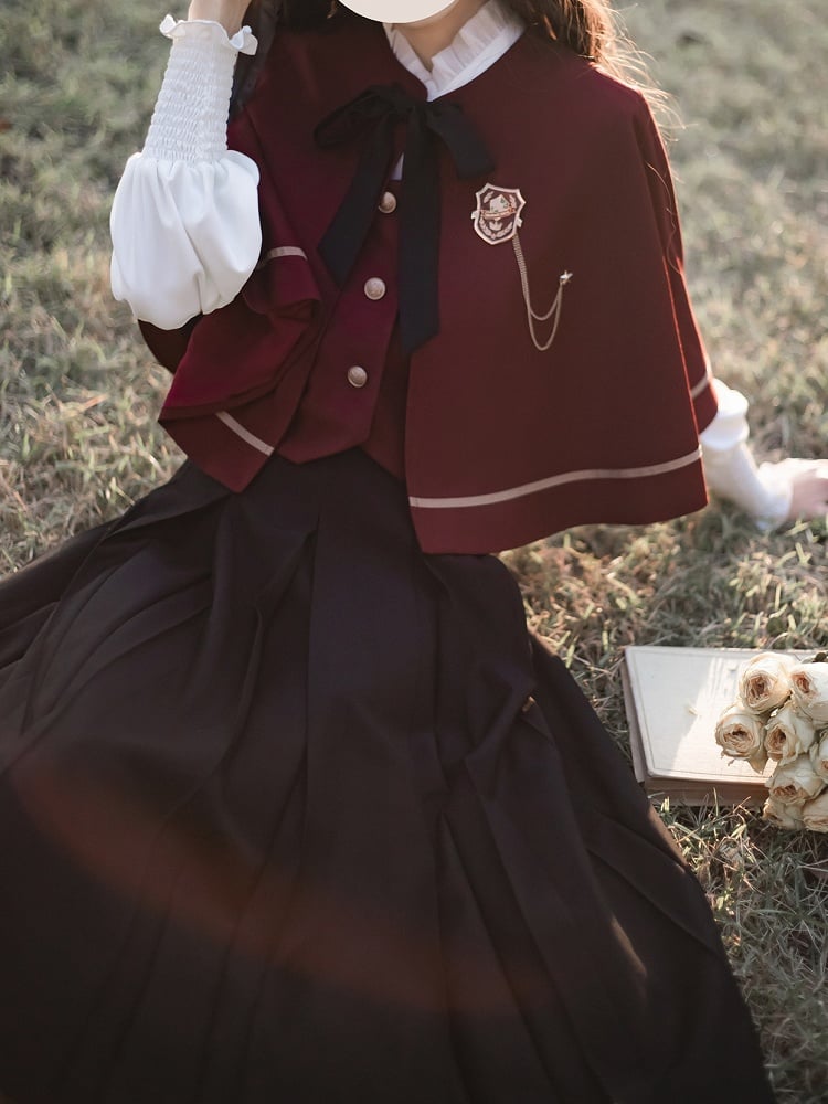 Roter Umhang der JK-Uniform mit selbstbindenden Trägern