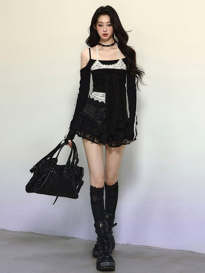 Schwarzes Neckholder-Oberteil mit langen Ärmeln und auffälligem Bindeakzent