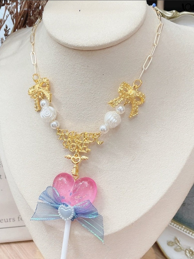 ネックレス 蝶結び 装飾ペンダント イエロー/ピンク/パープル ロリポップ ビーズ