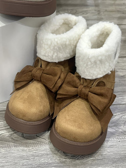 Braune Winter-Ugg-Stiefel mit Hasenohren und Schleife