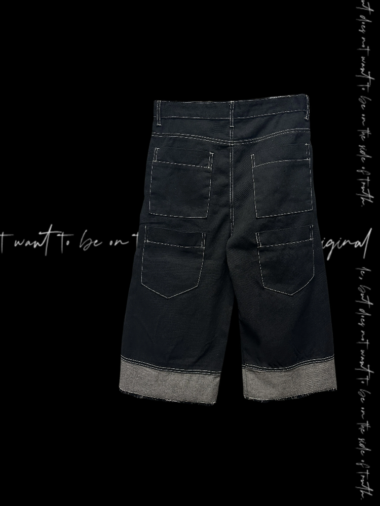 Jeans mit weitem Bein und verwaschener Schwarz-Mehrknopfleiste