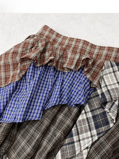 ミラードチェック柄ブラウンスカート ティアードファッション アシンメトリーヘムパターン