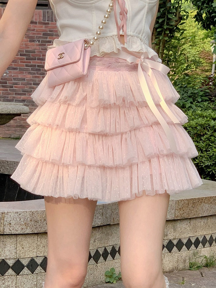 Gepunkteter Puff-Tupfen-Stufenrock mit Satinschleife in Rosa