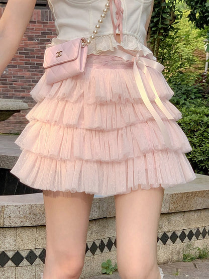 Gepunkteter Puff-Tupfen-Stufenrock mit Satinschleife in Rosa