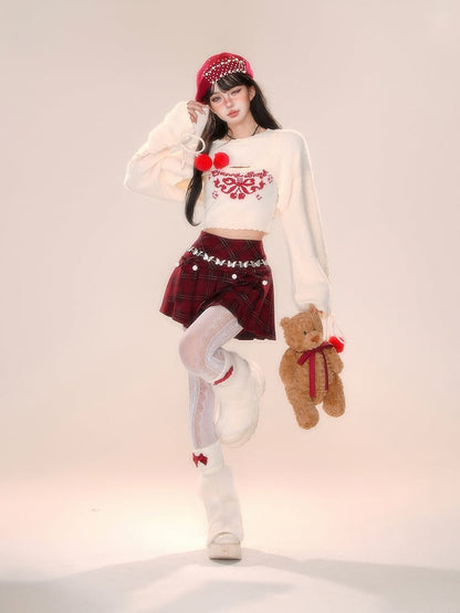 ピンクアプリコットの蝶結びクロップドトップス（シュラッグ付き）