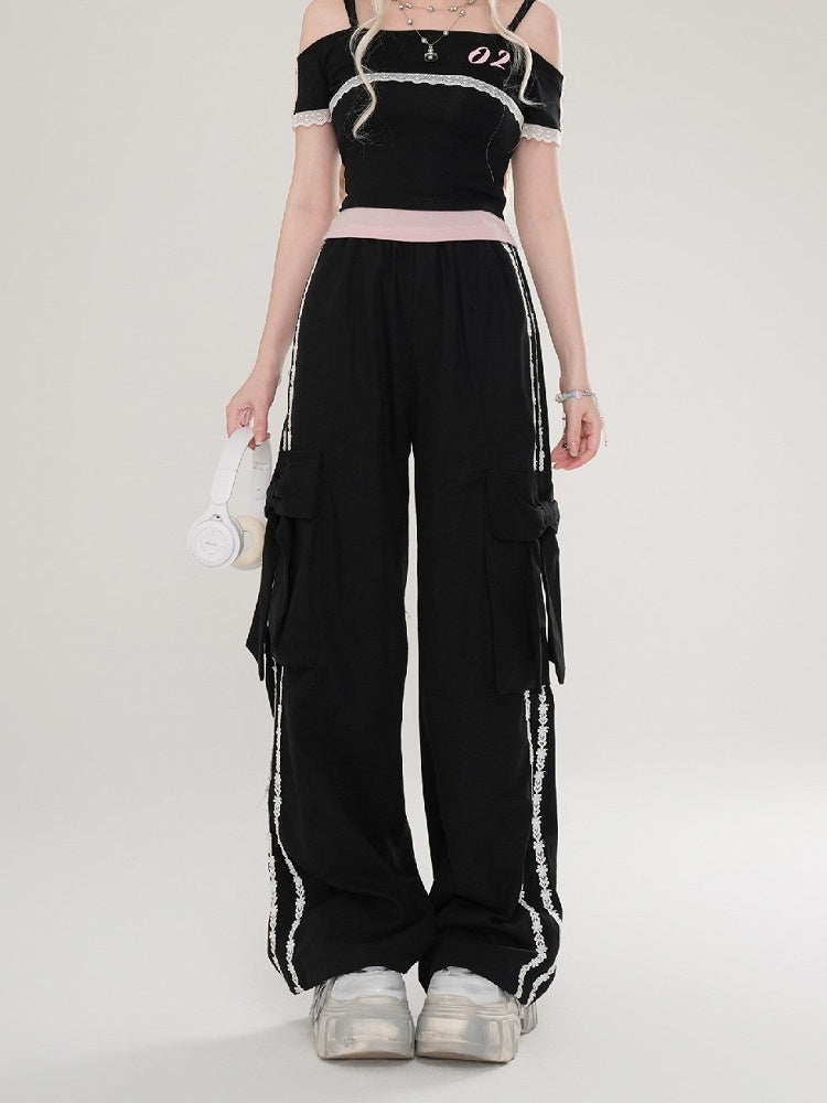 Hose mit floralen Schleifendetails und geradem Bein mit apricot/schwarzen Streifen und