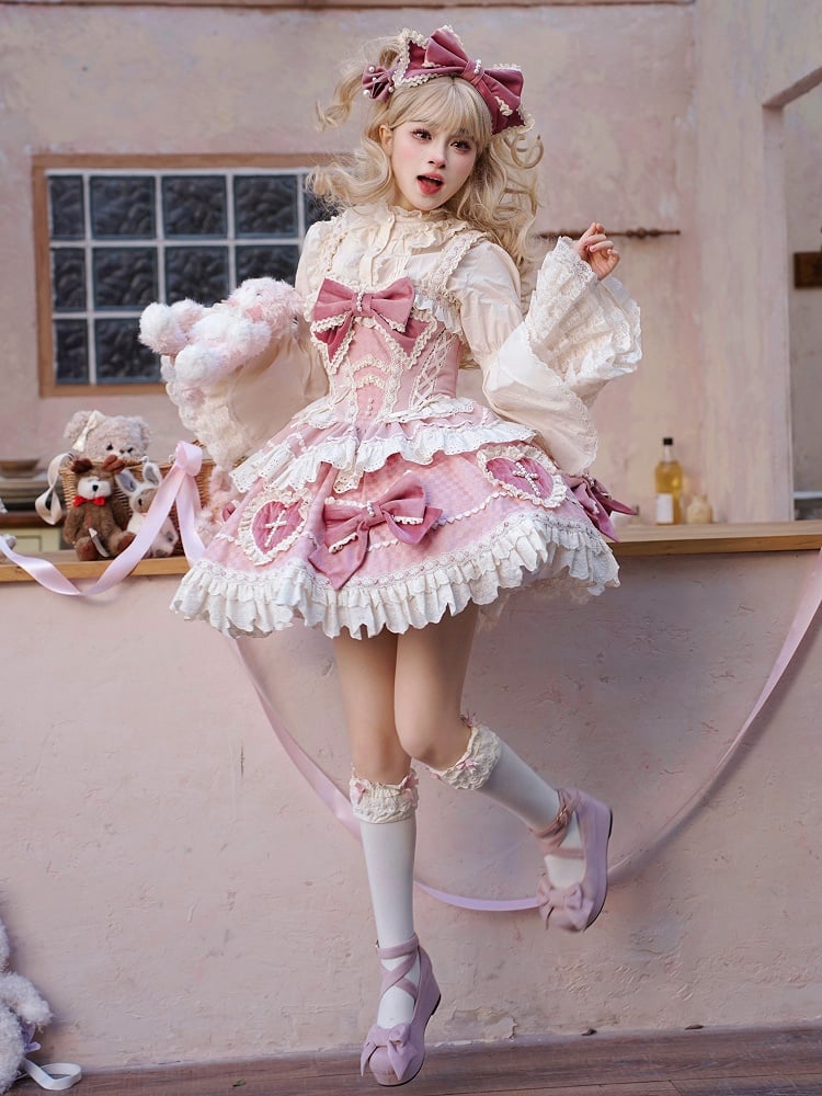 ピンクの蝶結びとハート型のアップリケスカートのスイートロリータドレス