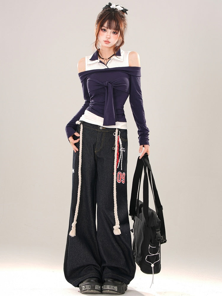 Marineblaues Patchwork-Top mit Krawattenakzent und Cut-Out-Schulter