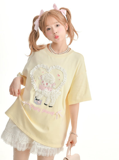 イエローのプラッシュラムアップリケフリルハートルーズTシャツクリーミー