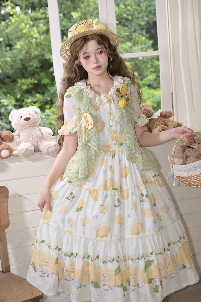 Grünes Tülltop mit Punkten und offener Knopfleiste