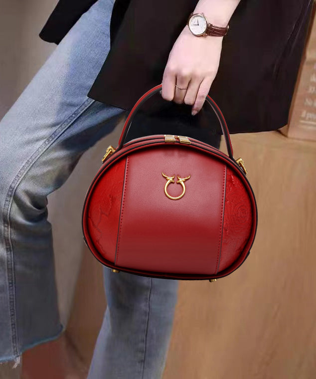 Runde, vielseitige, lässige Tasche aus braunem Kalbsleder