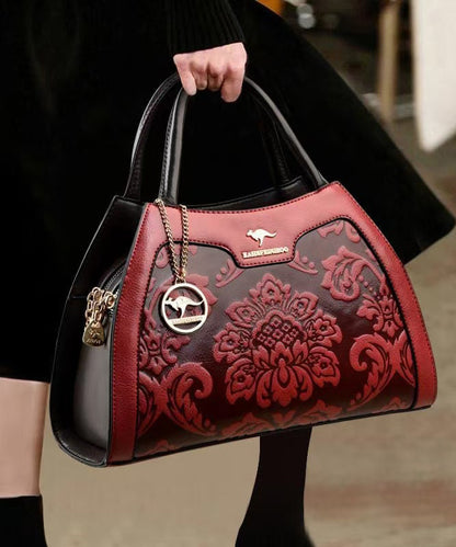 Elegante Kalbsleder-Tragetasche in Rot mit Prägung