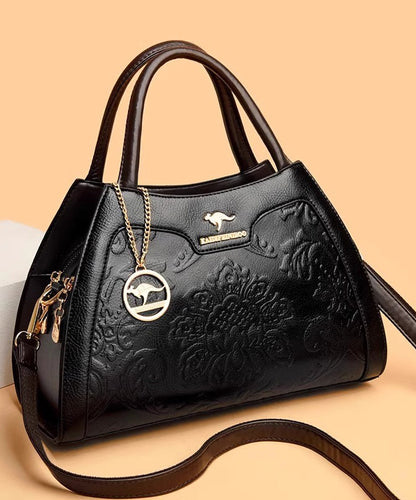 Elegante Kalbsleder-Tragetasche in Rot mit Prägung