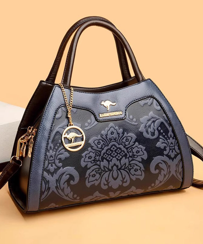 Elegante Kalbsleder-Tragetasche in Rot mit Prägung