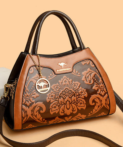 Elegante Kalbsleder-Tragetasche in Rot mit Prägung