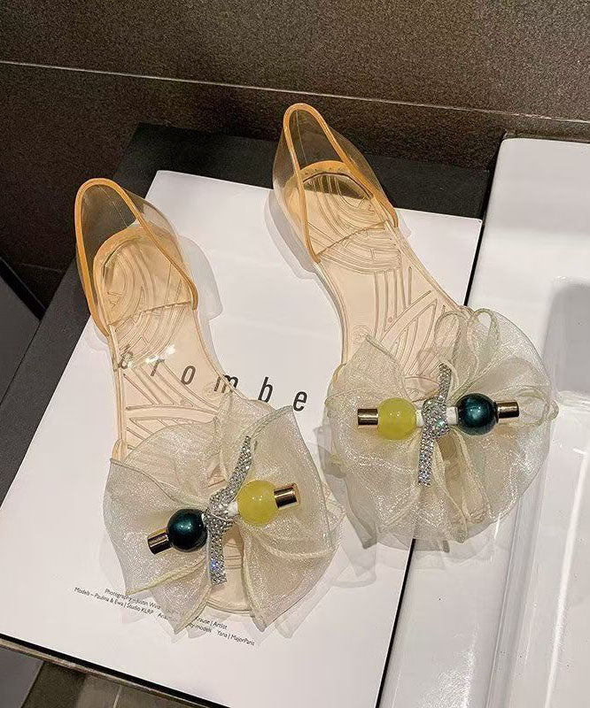 Transparente, gespleißte Zehenpartie, modische schwarze Peep-Bogen-Sandalen