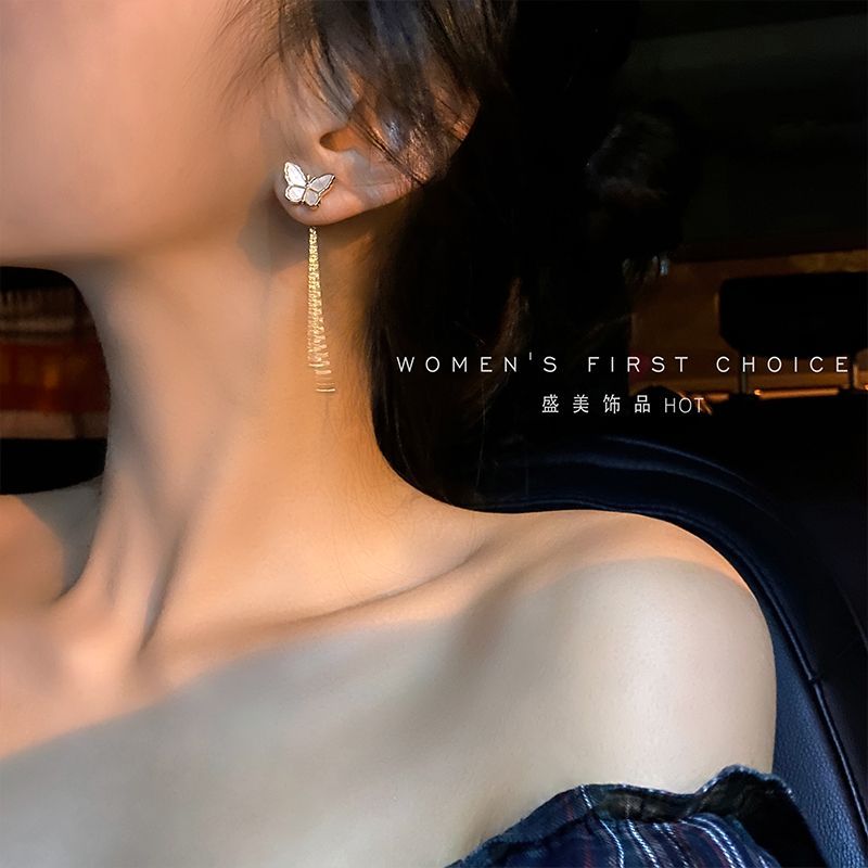 Schmetterlingsohrring aus Legierung mit Fransen